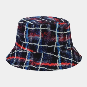 Detail of red and blue graffiti plaid pattern on a durable canvas bucket hat