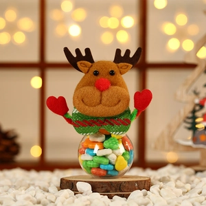 Mini Christmas reindeer candy jar with plush topper and transparent spherical container