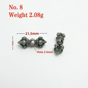 Detailed view of antique silver Vajra charms with dimensions and size 8 weight specifications