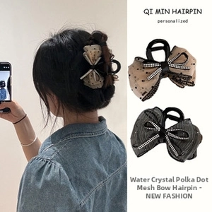 Detail of rhinestone polka dot mesh bow hair claw clip with semi-transparent fabric