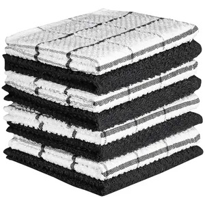 Classic black and white checkered cotton waffle weave kitchen towels stacked on white background