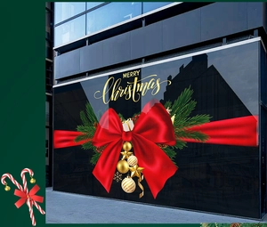 Christmas window decals featuring red bows, pine branches, gold ornaments and snowflakes