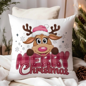 Close-up of a Christmas reindeer cushion cover with warm holiday lights and pine cones