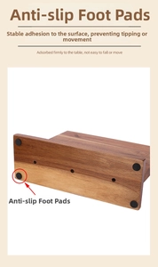 Detail of wooden knife block base with 4 anti-slip pads and natural brown wood grain