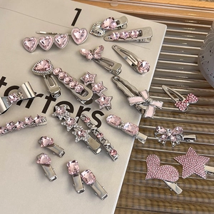 Pink heart rhinestone hair clip set with assorted silver metal butterfly and star designs