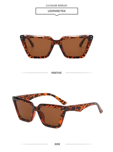 Detail of leopard print cat-eye sunglasses with tea lenses and metal rivet accents