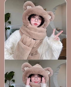 Close-up of brown plush hooded scarf with bear ears and thick faux fur texture