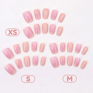French tip press-on nails set in sweet pink with diagonal stripe designs, sizes XS S M