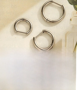 Titanium alloy sleeper hoop earrings shown in 8mm, 10mm, and 12mm internal diameters