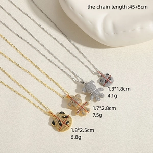 Three bear-shaped zircon pendant necklaces in gold and silver with size and weight specs