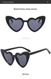 Detail view of heart-shaped sunglasses in black frame with gray lenses from front and side