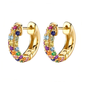 Detailed macro view of gold huggie earrings with double row rainbow pave crystals