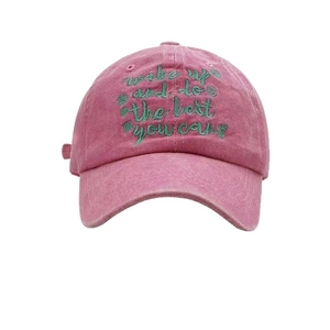 Washed pink cotton baseball cap with green embroidered wake up and do the best you can slogan