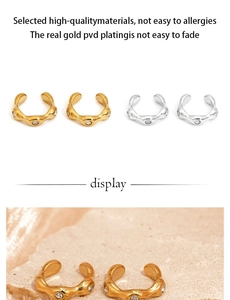 Detailed view of textured 316L stainless steel ear cuffs in gold and silver finish