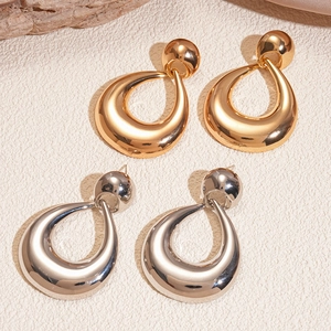 Retro geometric hollow teardrop earrings in gold and silver finish with metal texture