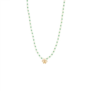 Minimalist pearl necklace with green beads and a golden bow pendant on white background