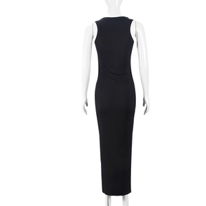Detail of black ribbed fabric and slim fit design on a sleeveless bodycon dress