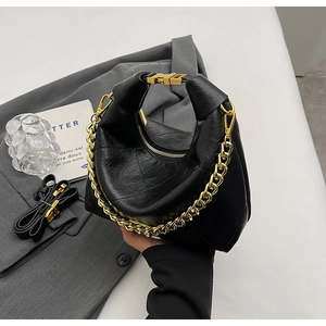 Chic black pleated hobo bag with a chunky gold chain and leather shoulder strap
