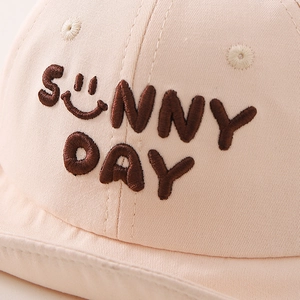 Pink infant baseball cap with sunny smile embroidery and soft brim for sun protection