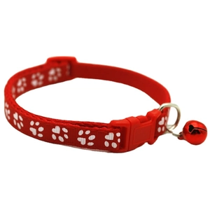 Red pet collar with white paw prints, adjustable webbing, bell and quick release buckle