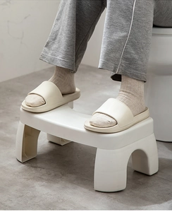 Detail of thickened non-slip toilet step stool with U-shaped design for bathroom use