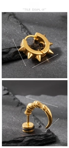 Detailed view of gold punk stainless steel spiked hoop and claw stud earrings