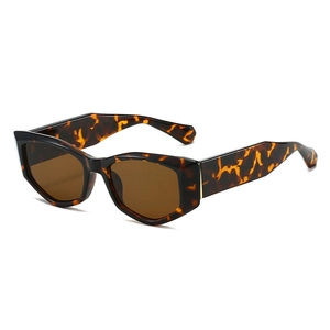 Retro cat-eye tortoiseshell sunglasses with brown lenses shown in a 45-degree angle view