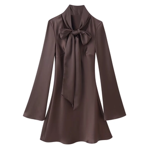 Elegant dark brown satin mini dress with oversized bow neck and flared sleeves on white