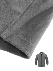 Gros plan sur la texture du tissu polaire gris foncé d'une veste à col montant