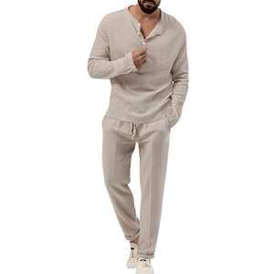 Men's casual beige linen set featuring a long sleeve Henley shirt and drawstring pants