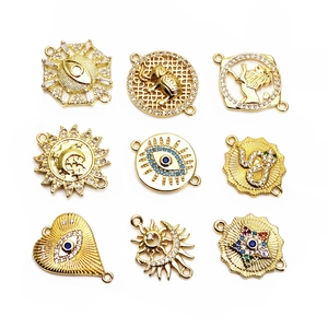 Gold zircon connector charms set featuring evil eye, moon, and animal designs for DIY jewelry