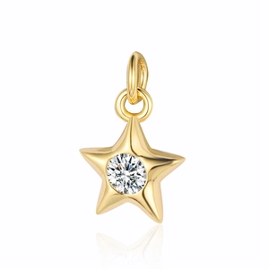 Detail of a gold star charm with a central sparkling round cubic zirconia and top ring