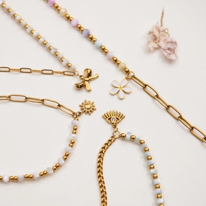 Détails de bracelets en acier doré 18K avec pendentifs fleur et œil protecteur