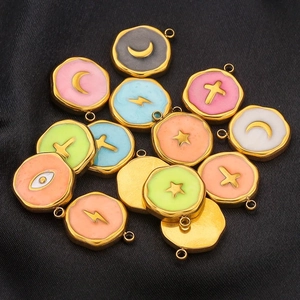Assorted stainless steel enamel charms featuring star moon and lightning bolt symbols