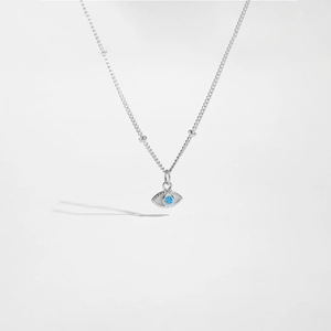 Detailed macro view of S925 silver Evil Eye pendant with a marquise blue gemstone