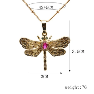 Close-up of golden dragonfly pendant necklace with 42+5cm chain dimensions and weight details
