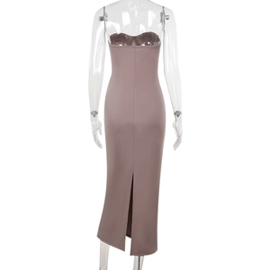 Detail view of coffee brown knitted slim fit dress showing the back slit and bodycon silhouette
