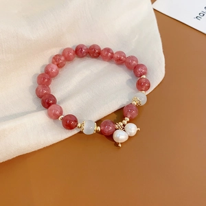 Beaded strawberry quartz bracelet with fresh water pearls and gold plated metal floral charms