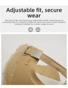 Detailed view of adjustable silver metal buckle and distressed fabric on khaki baseball cap