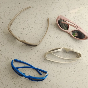 Kids vintage cat-eye sunglasses in beige, pink, white, and blue colors for outdoor beach