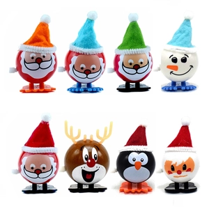 Set of 8 colorful Christmas wind-up toys including Santa, Snowman and Reindeer