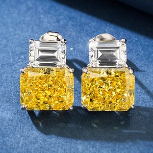 Luxury S925 silver stud earrings featuring large yellow radiant cut diamonds and accents
