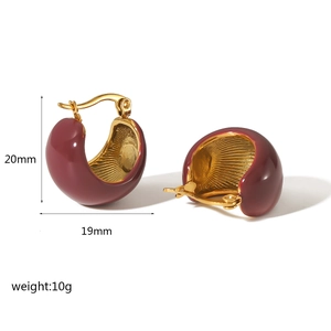 Detail view of 18K gold plated dark red enamel hoop earrings with size and weight specs