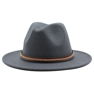 Detailed view of grey wool felt jazz hat with a brown braided faux leather band