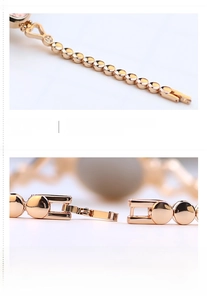 Macro detail of rose gold alloy watch strap with polished finish and jewelry clasp