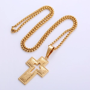 Gothic 18k gold plated stainless steel cross necklace with intricate embossed design