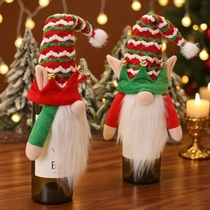 Christmas gnome wine bottle covers set with red and green knitted hats and golden bells