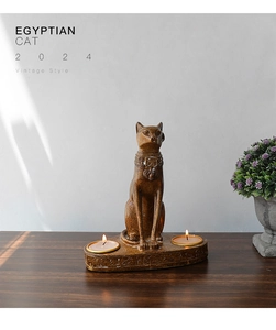 Close-up of Egyptian Bastet cat candle holder with vintage wood grain texture and tea lights
