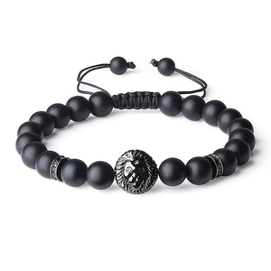 Detail of adjustable braided cord on 8mm tiger eye stone bracelet with lion head