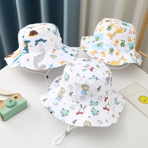 Three assorted cotton sun hats with cartoon patterns and adjustable chin straps